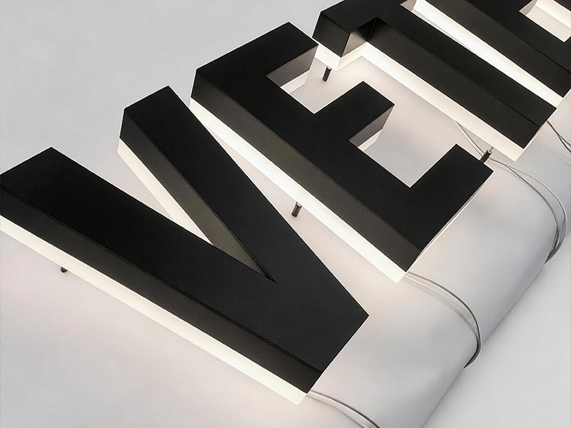 Black painted backlit channel letters
