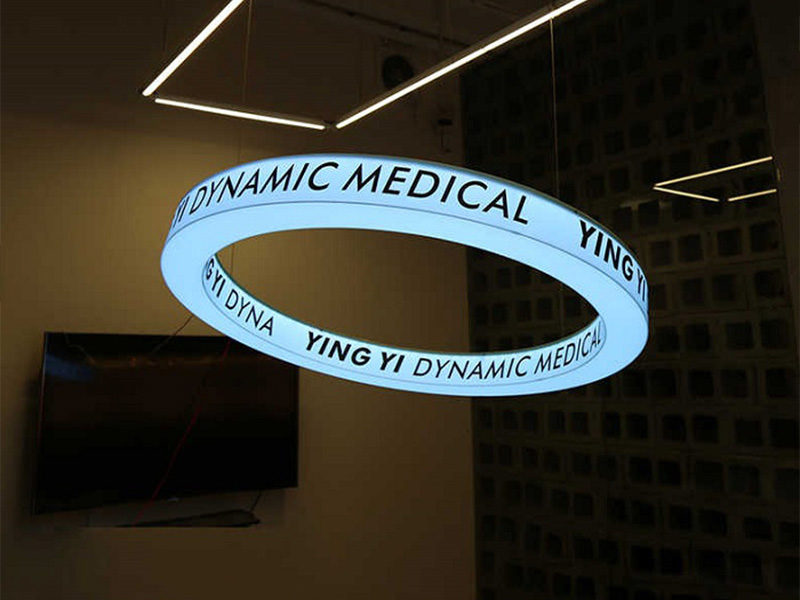 Custom circular suspended lightbox sign