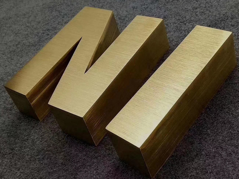Brushed brass metal 3D letters