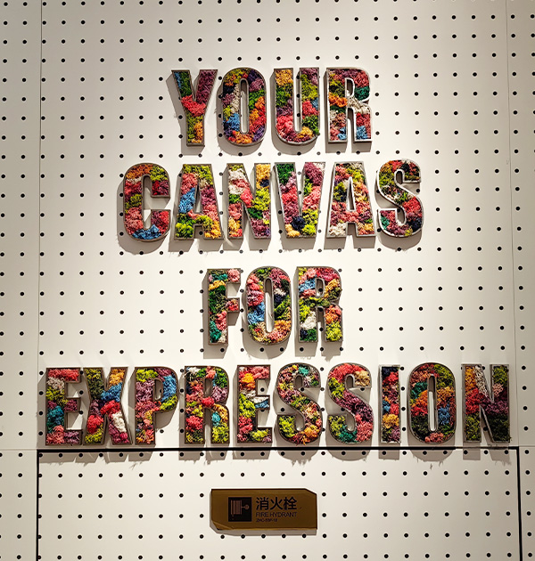 Moss channel letters on the wall