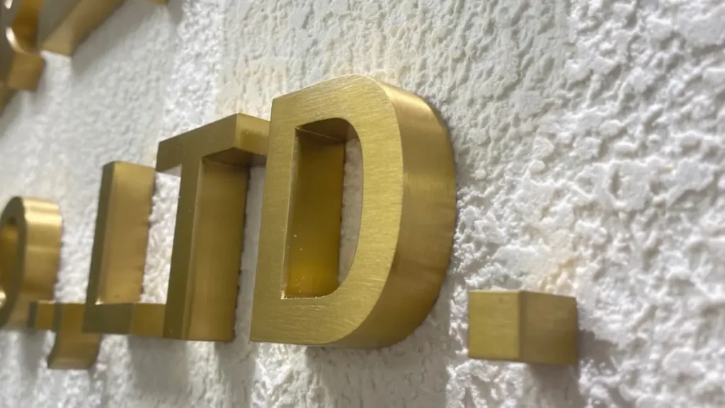 brushed and PVD stainless steel signage